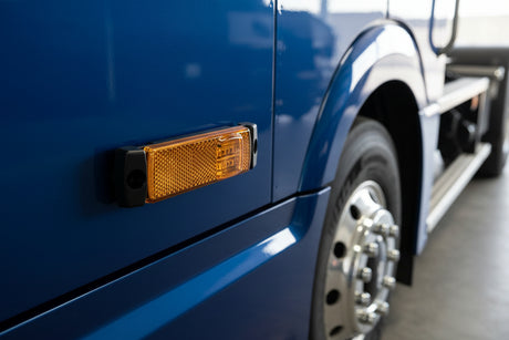 Blue truck side marker lamp: orange LED, 12/24V, surface-mount, 130x32x15 mm.